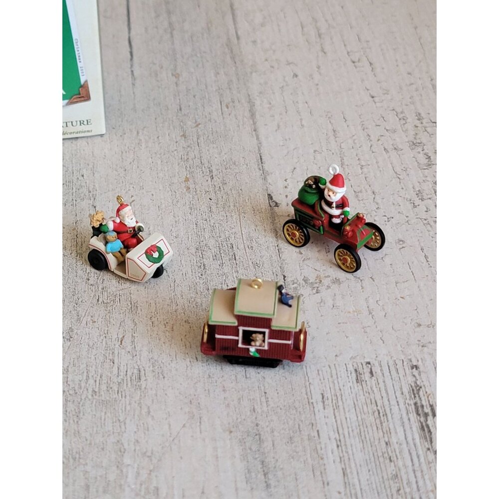 Hallmark here comesβ Santa miniature car train ornament Xmas set